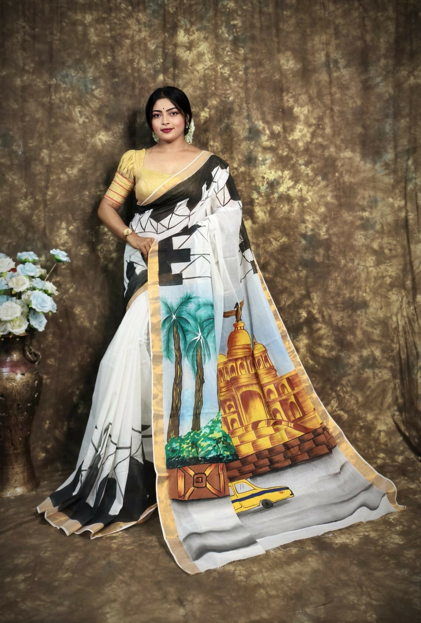 Hand-Painted Kerala Cotton Saree with Scenic Cityscape Pallu & Golden Border