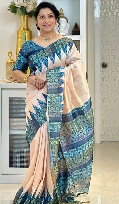 Elegant Peach Handcrafted Tussar Silk Saree with Contrasting Blue Border & Blouse Piece